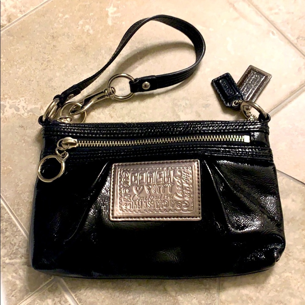 Coach black patent leather wristlet